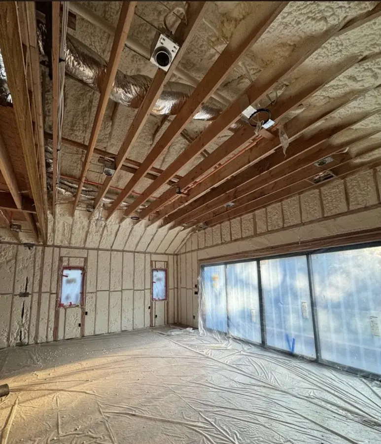 Interior walls and ceiling insulated with spray foam during new construction in Fox Crossing